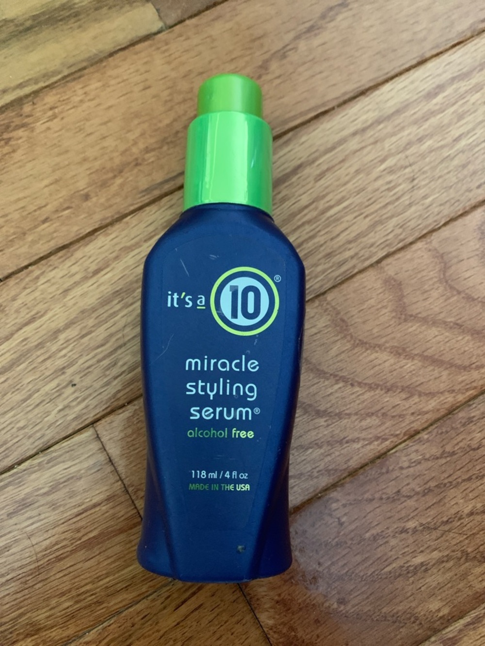 It's a 10 Miracle Styling Serum – Blue Bottle with Green Pump
